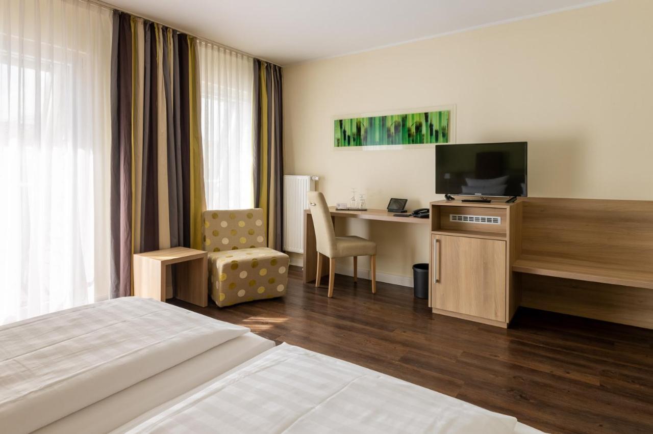 Hotel Am Schlosspark Garni Хузум Екстериор снимка
